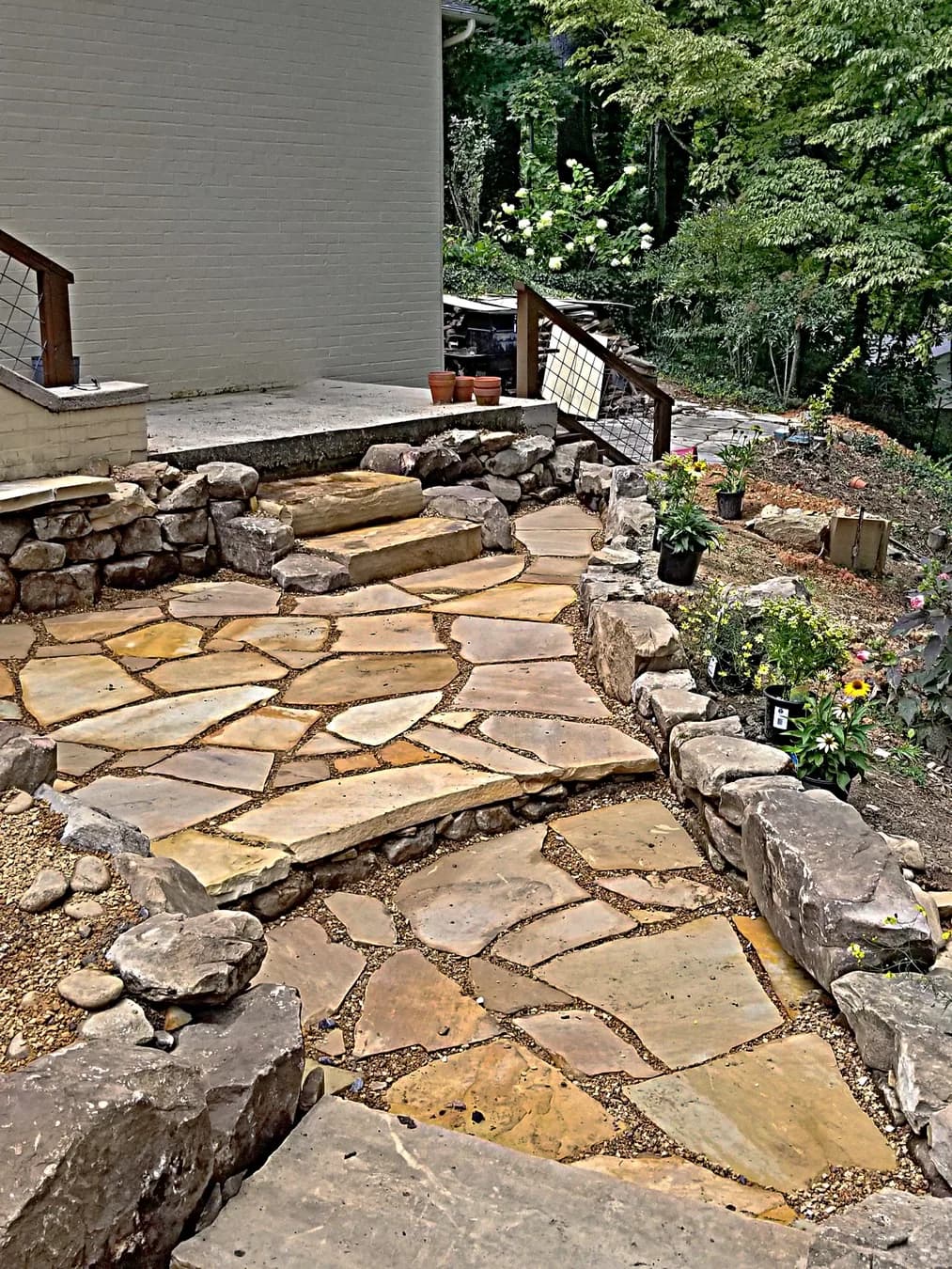 Close view of flagstone walk with pea gravel joints