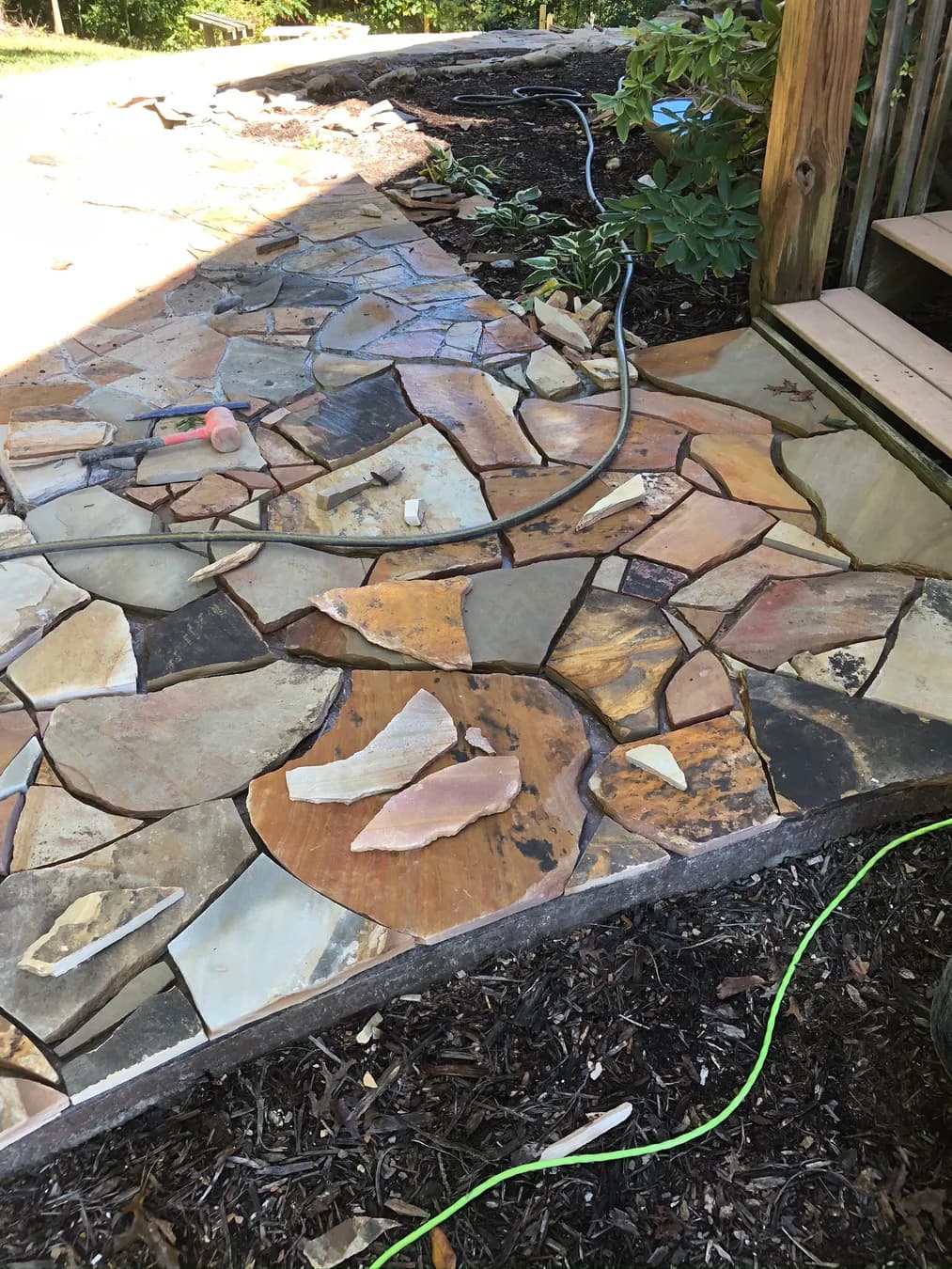 Close view of mortared flagstone fitment and joint layout, view 8