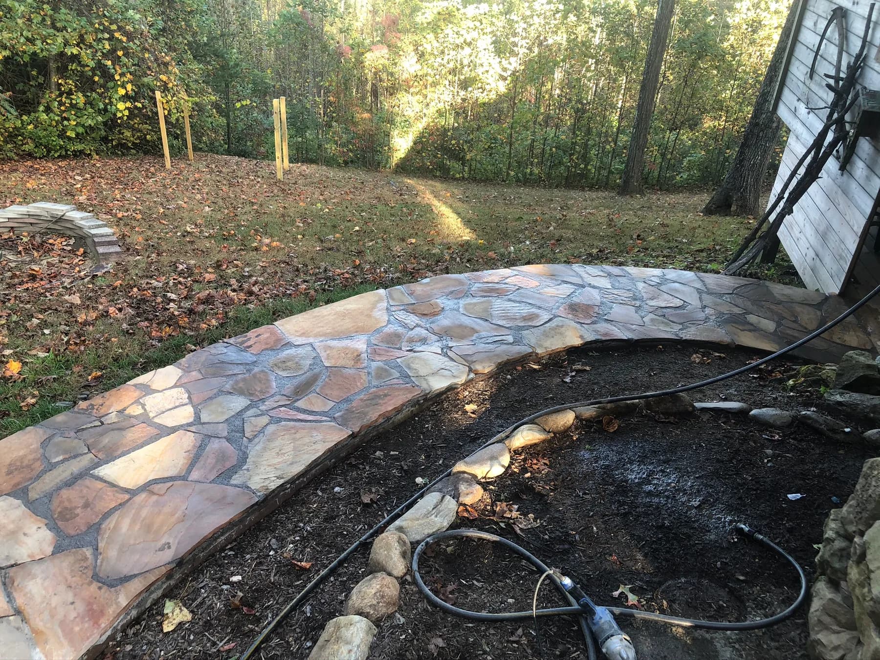Mortared flagstone curve set into the mountain garden edge, view 12