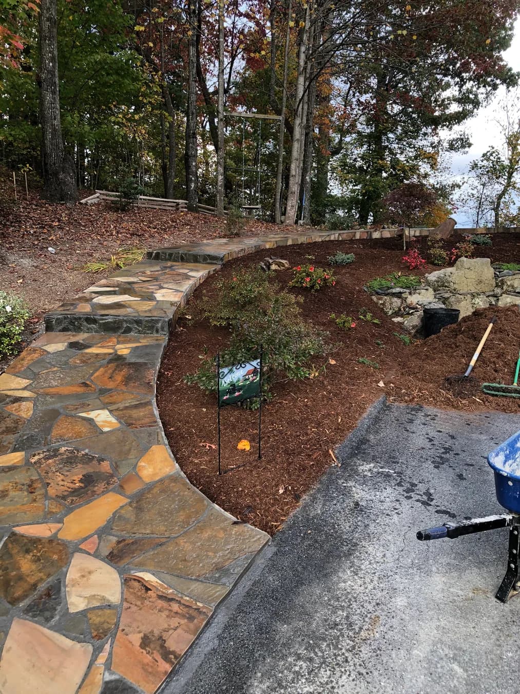 Mortared flagstone walk with step transition in a mountain landscape, view 14