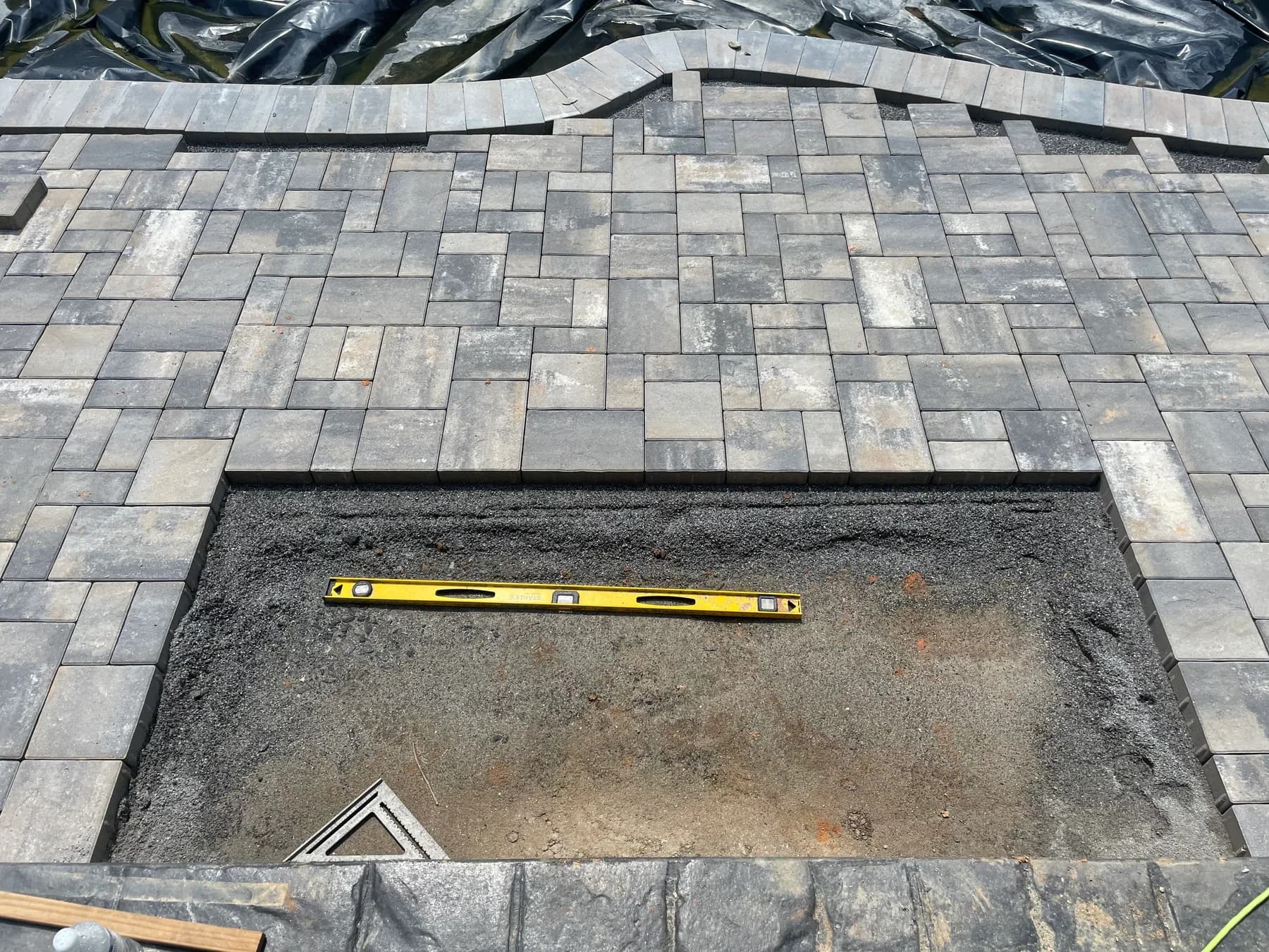Poolside paver surface with rectangular inset detail