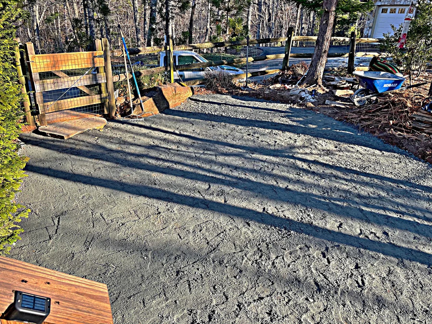 Compacted base preparation and project layout for natural stone patio, view 3
